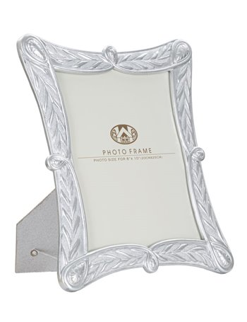 Portafoto cornice x argento cm 28,2x2x33
(misura interna cm 20x25)